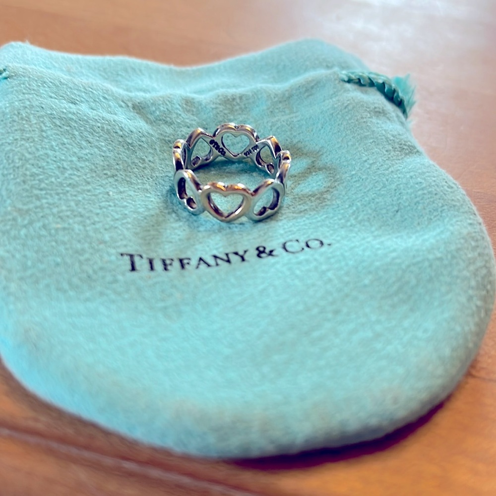 Tiffany’s sterling silver and 18k rose gold heart ring. Size 8